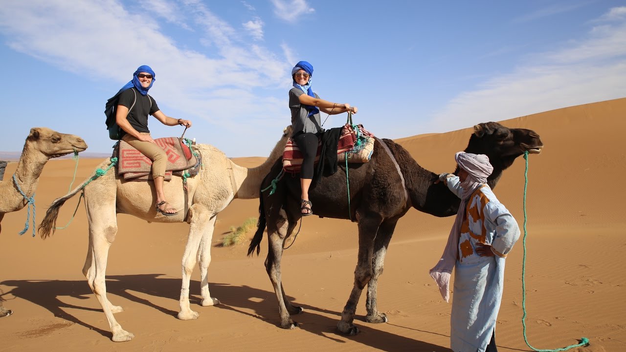 RIDING CAMELS THROUGH THE SAHARA - MOROCCO