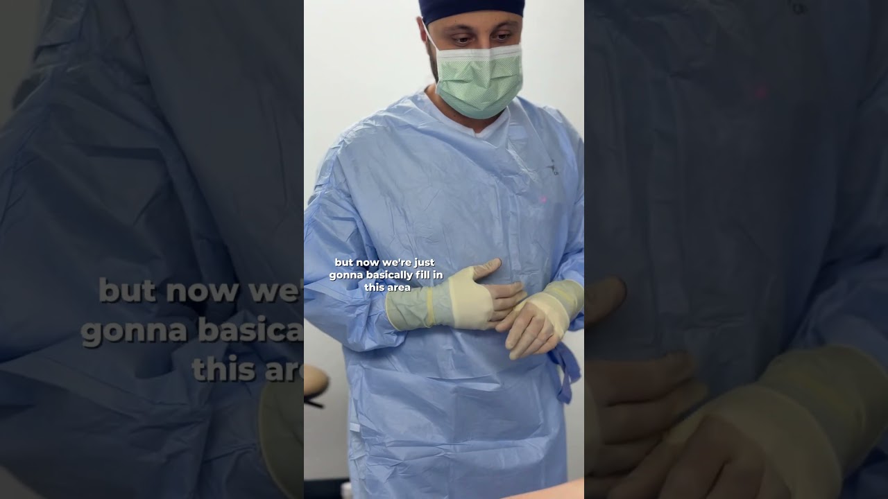 Medical professional preparing for a procedure.