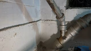 OLD LEAKING CAST IRON DRAIN PIPE REPLACED