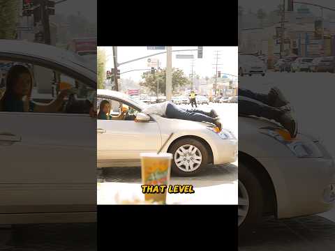 A lady is driving with a man through her windshield #shorts