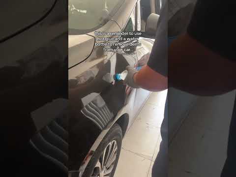 this is a reminder to use hot glue and a water bottle to remove dents from your car..