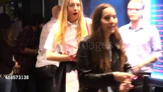 ALANA HAIM & ESTE HAIM enter the Mumford & Sons performance at the Roxy in West Hollywood