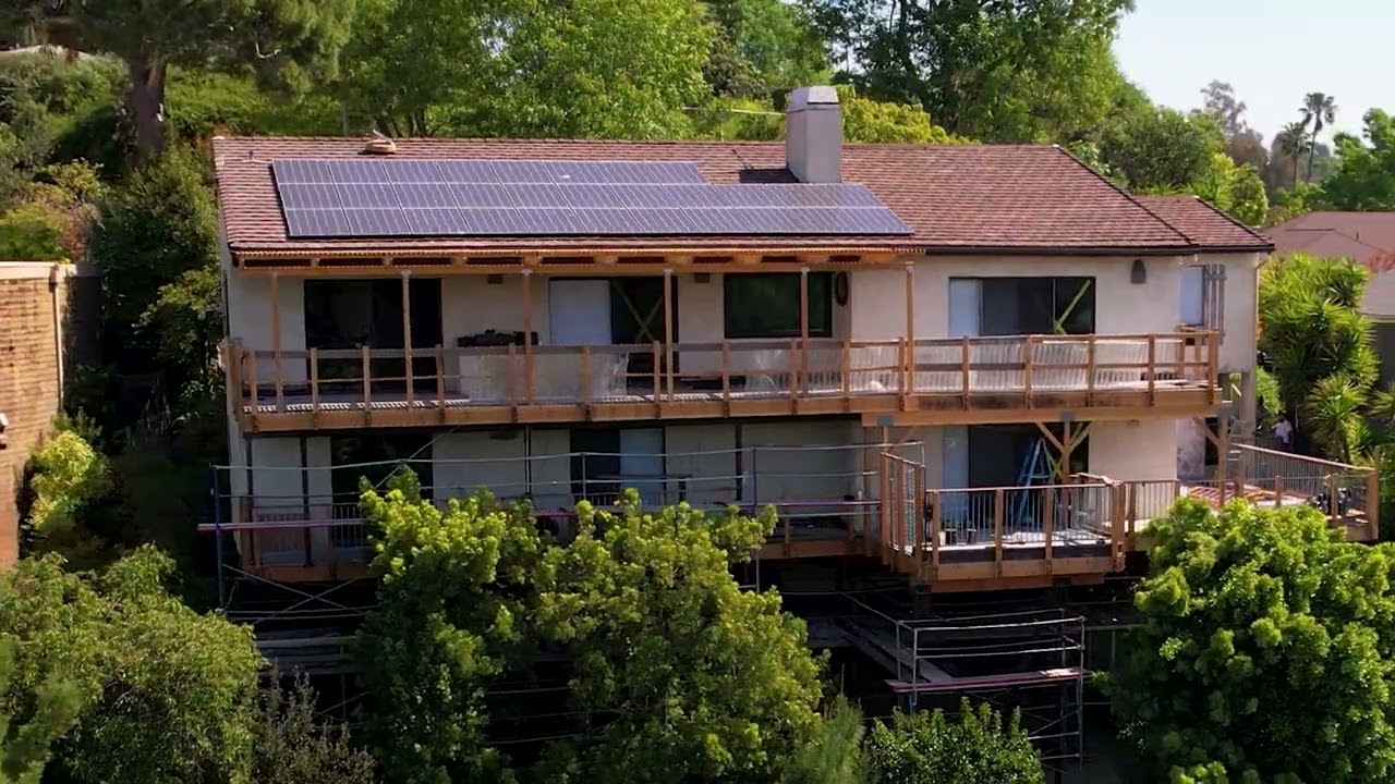 Animated house with repair tools illustration.