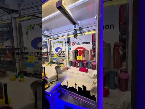 Trying to win a PS5 from the claw machine!