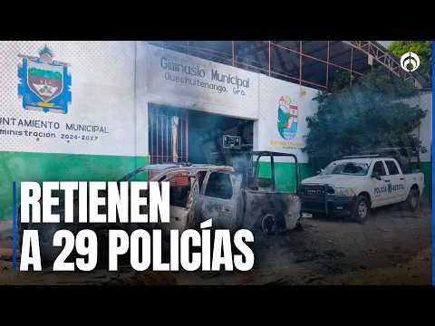 Pobladores retienen a elementos de seguridad y queman patrullas en Quechultenango