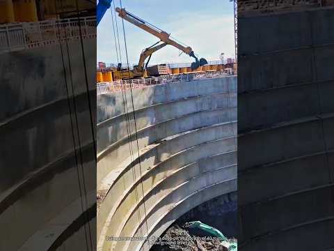 Using an excavator to dig a deep pit at a depth of 40 meters below ground level