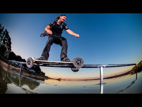 GRINDING OVER A RIVER ON A MOUNAINBOARD ( New Cross Lockers!!)