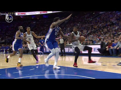 Kyrie Irving draws controversial foul on Joel Embiid after hard fall | NBA on ESPN
