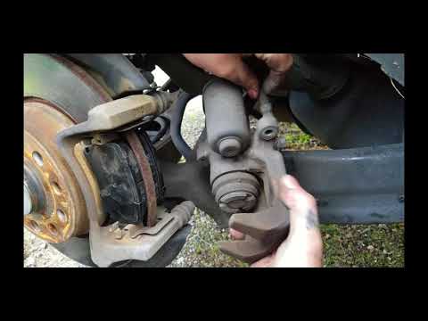 How to manually release electronic parking brakes (2012 Tiguan)