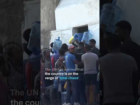 Haiti: Dozens of people escaping gang violence swim across country's longest river | DW News