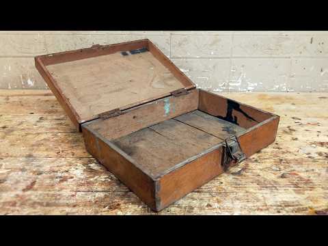 Worn out wooden box. Restoration.