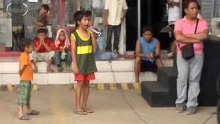 a street child singing i will always love you by whitney houston