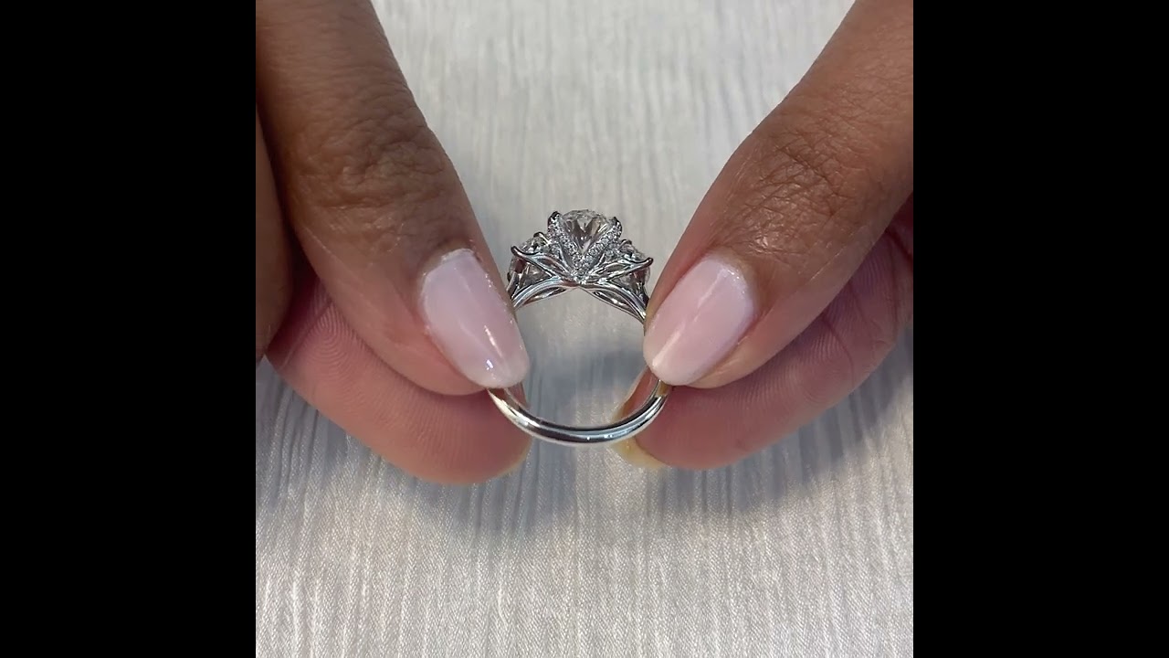 3.06 carat Oval Shape Lab Diamond Lotus Three-Stone Engagement Ring