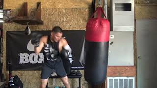 VERGIL ORTIZ PUNISHING THE HEAVY BAG WHILE SHOWING FORM, SPEED & AGILITY
