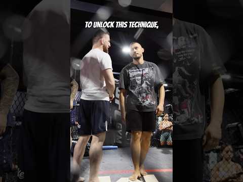 Single-leg takedown with the head on the outside, executed by Merab Dvalishvili against Umar.