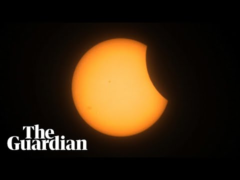 Partial solar eclipse seen over Norway and Canada – watch live
