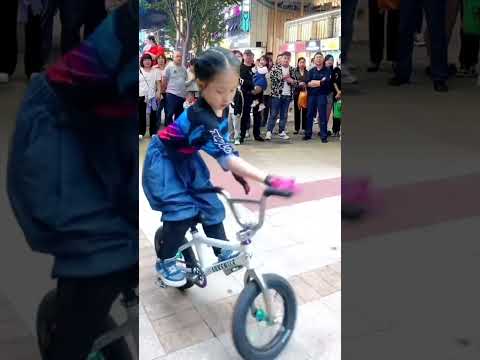 This little princess has amazing driving skills. Passerby's perspective. The masters are among t