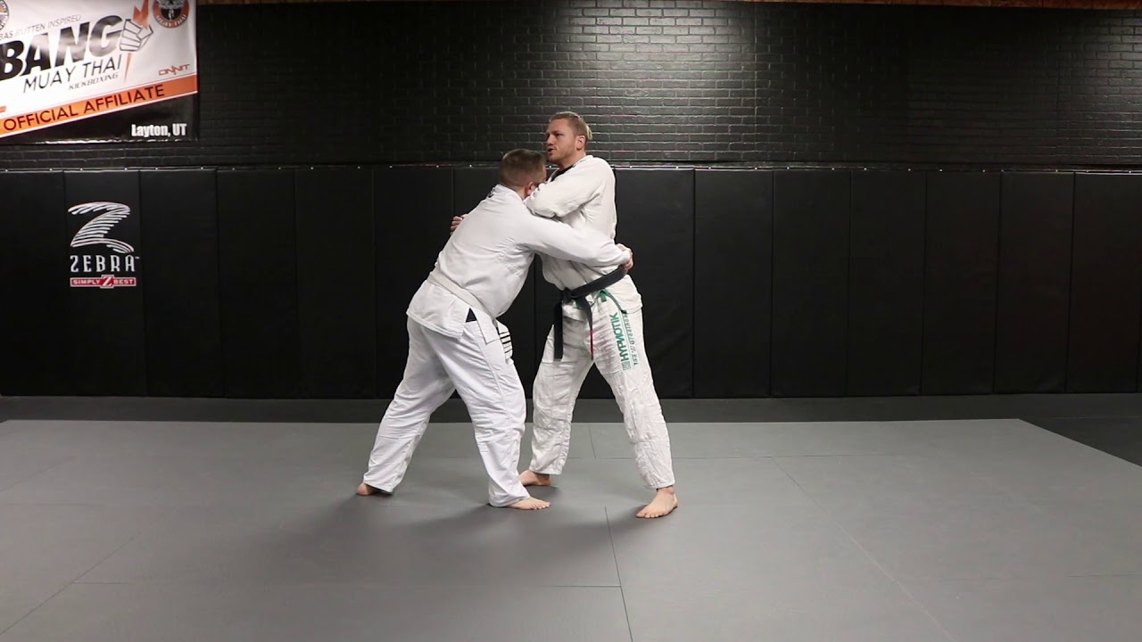 Front bear hug under arms defense (with frame)