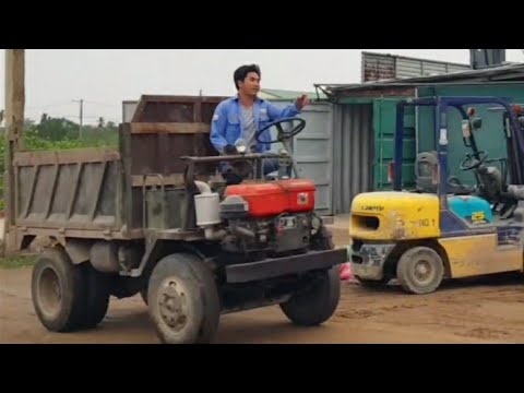 Construction material transport tractor, Excavator loading sand onto tractor, Dump truck