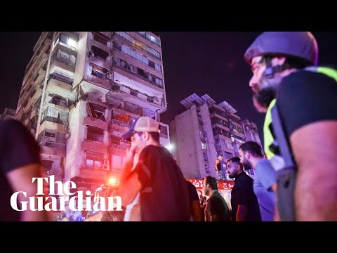 Rescue workers gather in central Beirut at site of apparent Israeli strike