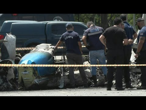 Plane crash on Sao Paulo avenue leaves at least two dead, six injured | AFP