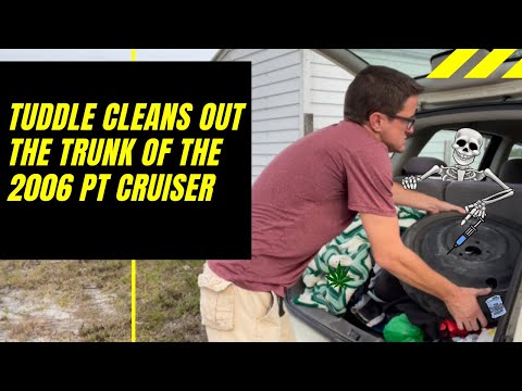 TUDDLE CLEANS OUT THE TRUNK OF THE PT CRUISER