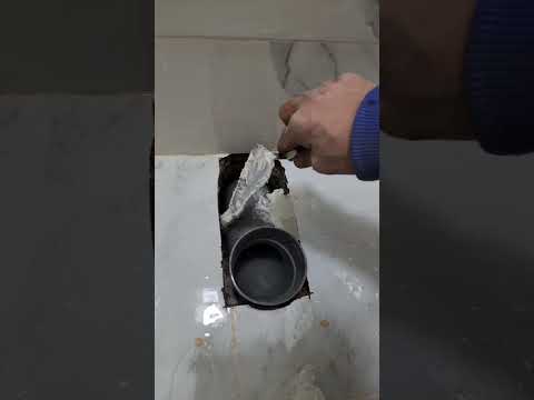 من الحفر وتركيب كوع مقعد المرحاض إلى تركيبه