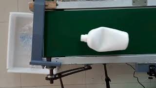 Automated Plastic Bottle Separator Using CNN and Sweep Arm