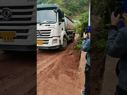 The tanker went downhill on the mud road