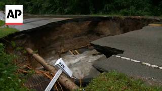 YouTube video thumbnail: Severe Storms Create Sinkholes and Flood Streets in Indiana