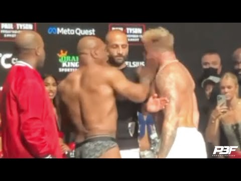 MIKE TYSON SLAPS JAKE PAUL AT WEIGH IN CAUSING ABSOLUTE CHAOS