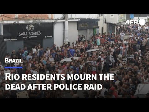Residents mourn after deadly Rio police crackdown on powerful narco gang | AFP