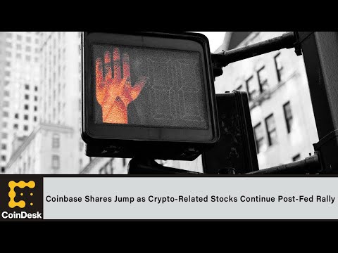 Coinbase Shares Jump as Crypto-Related Stocks Continue Post-Fed Rally