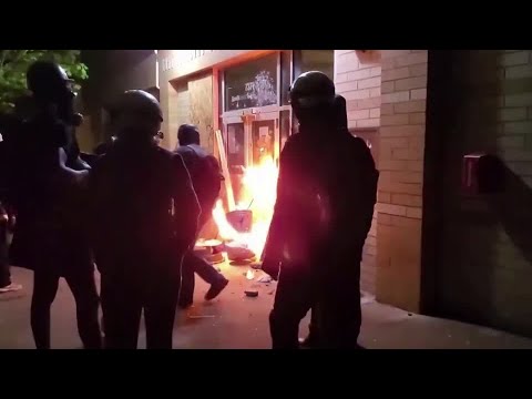Portland protesters set fire outside precinct