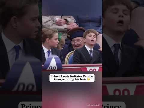 Prince Louis imitates Prince George doing his hair