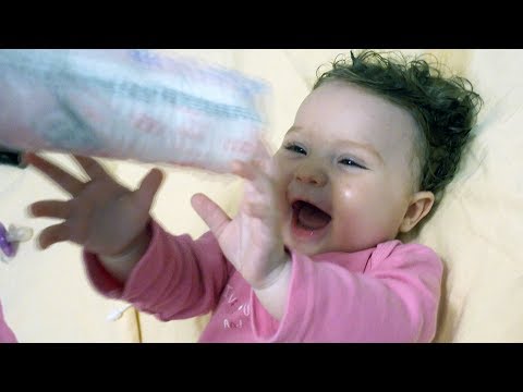 Happy Baby Laughing Hysterically at Plastic Bag