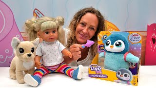 Spielspaß mit Nicole - Baby Born Pippa bekommt ein Geschenk - Der kleine Plüsch-Pinguin