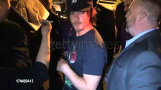 Norman Reedus signing autographs at Celebrity Sightings - Comic-Con International 2013