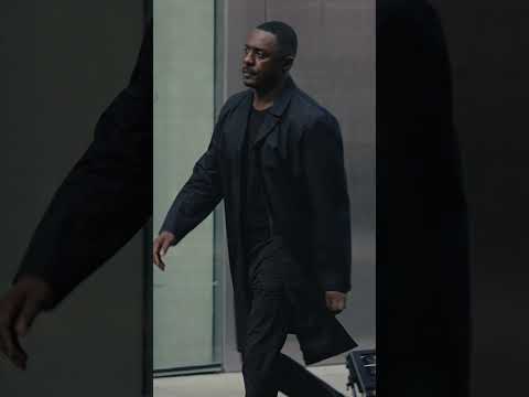 #idriselba is dressed for the moment, wearing the Calvin Klein Classic Trench Coat.