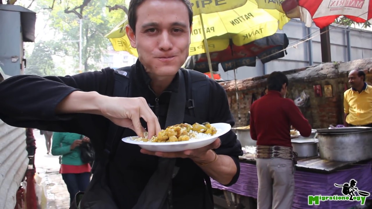 Street Food in India - Bengali Fish Curry and Rice on Camac Street, Kolkata, India