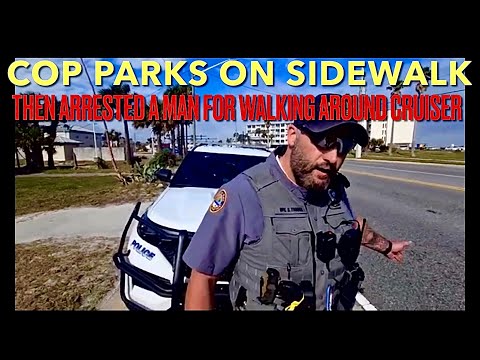 Cop Parks On Sidewalk-Then Arrest Man For Walking Around Cruiser.