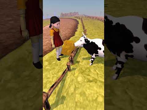 A doll feeds a cow