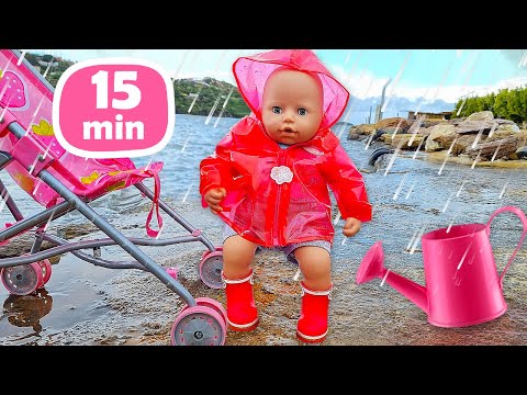 Baby Annabell doll goes for a walk. Let's dress up in rainy boots and a raincoat and play outdoors.