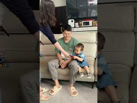 The baby plays with the phone when dad is not paying attention #baby #funny #cutebaby