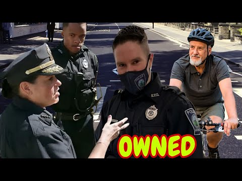 COP GOES FULL ROAD RAGE ON CYCLIST!