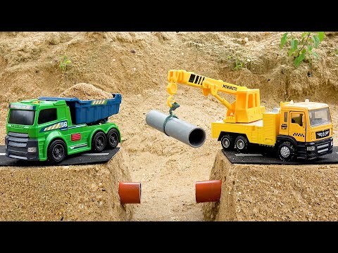 crane truck repairing water pipes and sand truck building bridge | BIBO STUDIO