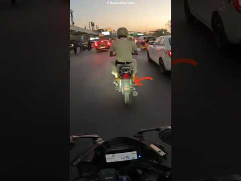 The Policeman Is Riding A Bike Without Number Plate