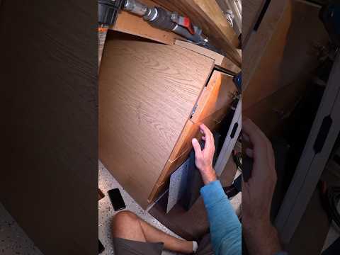 Helping elderly to get his floor safe opened.