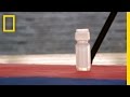Knocking Over a Bottle Challenge