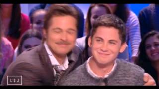 Fury actor Brad Pitt snuggling co-star Logan Lerman. So cute!